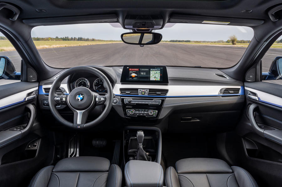 aria-label="93 bmw x2 phev official press cabin"