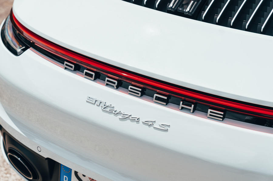 aria-label="11 porsche 911 targa 2020 uk fd rear badge"