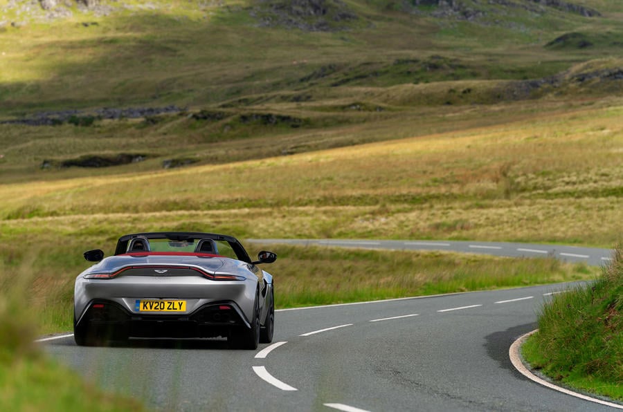 aria-label="16 aston martin vantage roadster 2020 uk fd cornering rear"