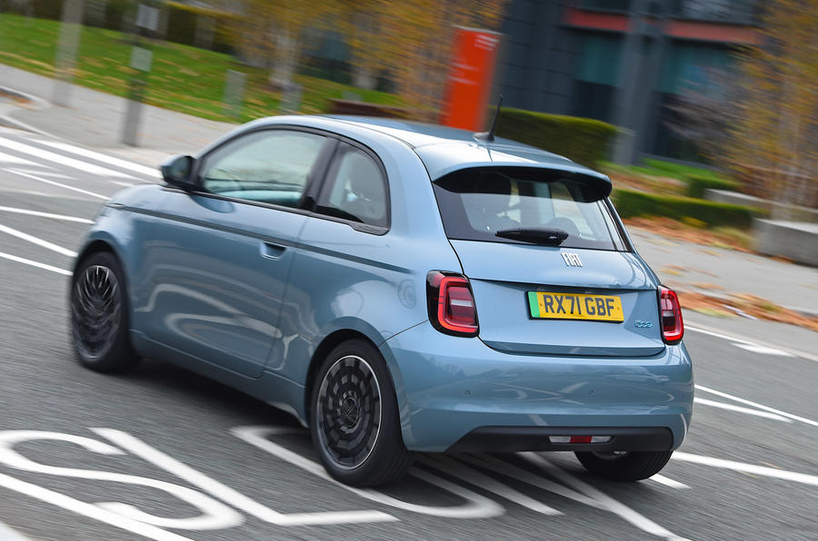 aria-label="2 fiat 500 electric 2022 road test review tracking rear"