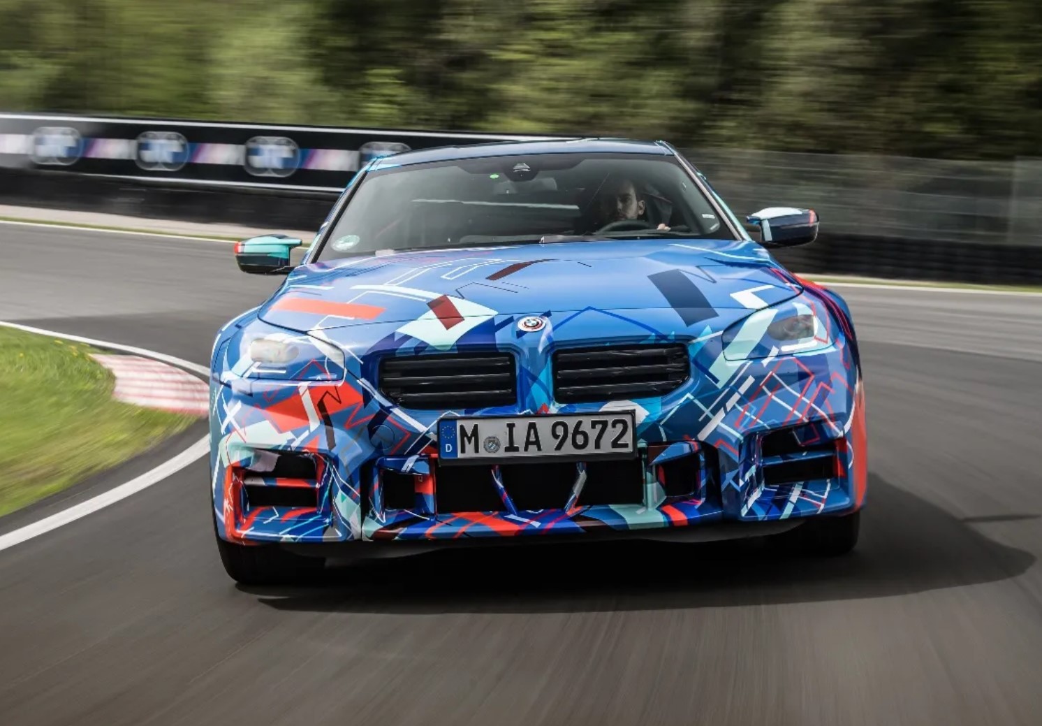aria-label="2023 BMW M2 revoiew protrotype blue camo 7"