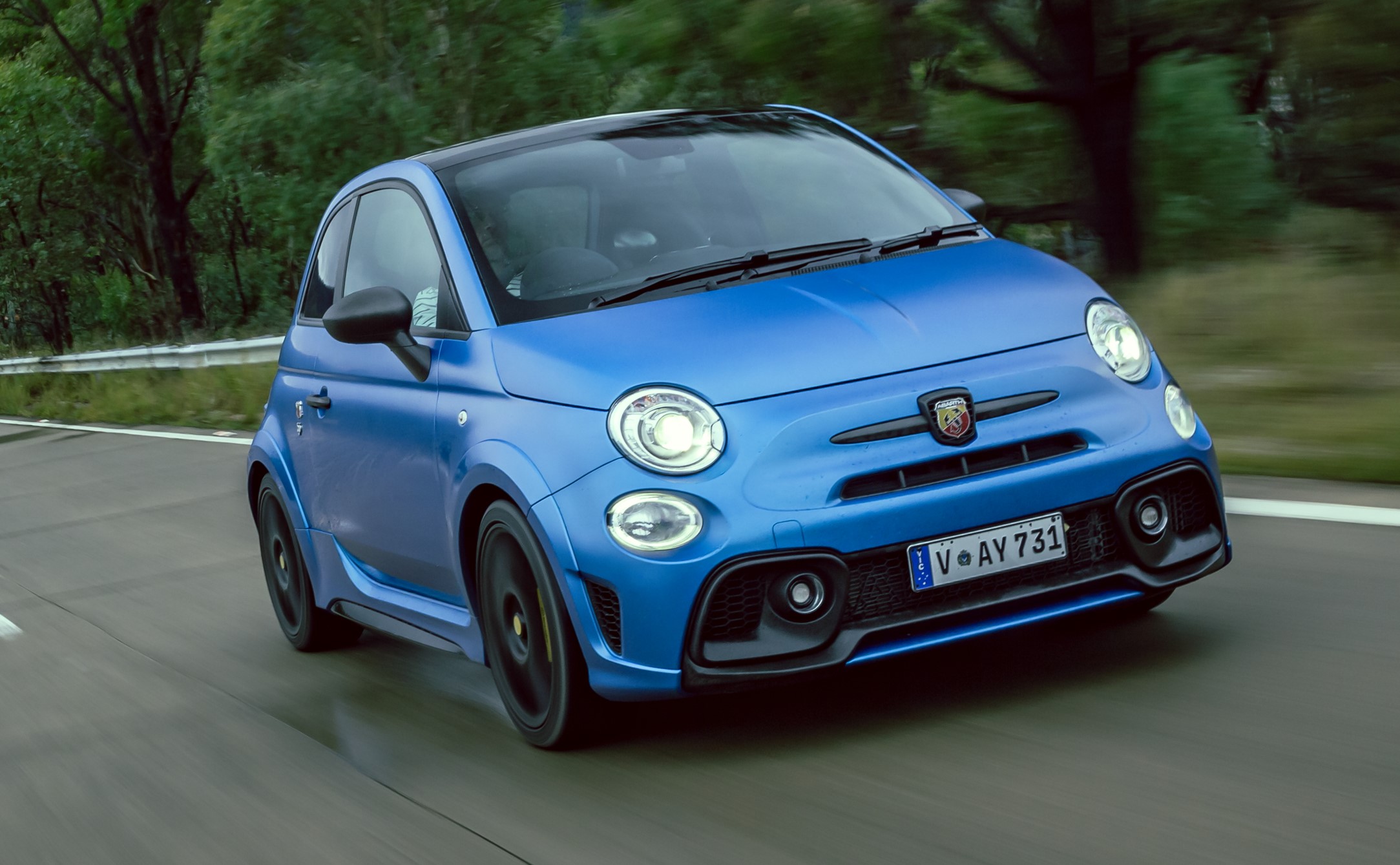 aria-label="abarth 595 blue road front fast"