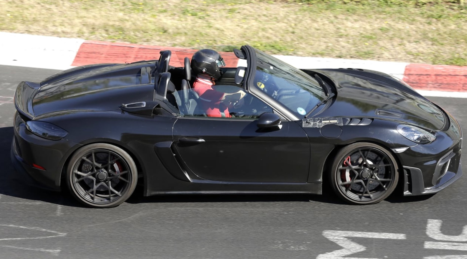 aria-label="2023 Porsche GT4 RS Spyder roof down spy pics 2"