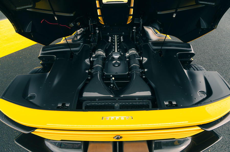 aria-label="Ferrari Daytona SP3 Yellow race track 19"