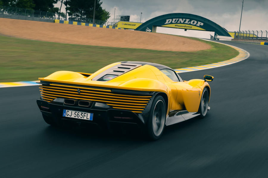 aria-label="Ferrari Daytona SP3 Yellow race track 7"