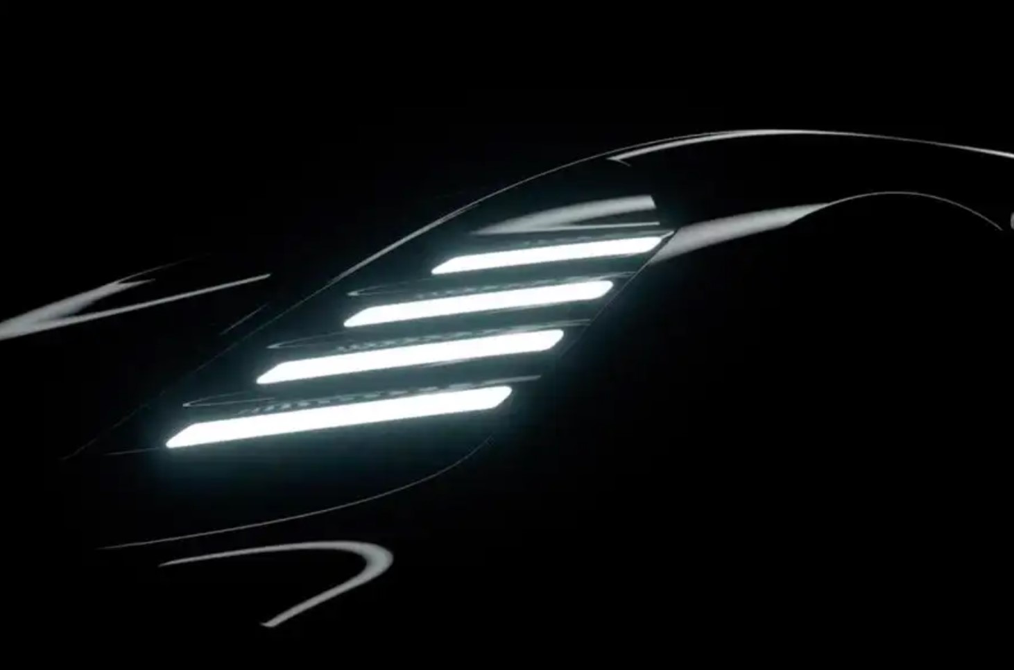 aria-label="bugatti monterey 2022 new model teaser headlight"